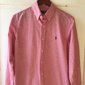 Red and white checkered button down shirt.